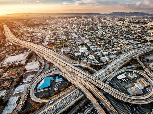 Helicopter view of highway interchange in Los Angeles, California.