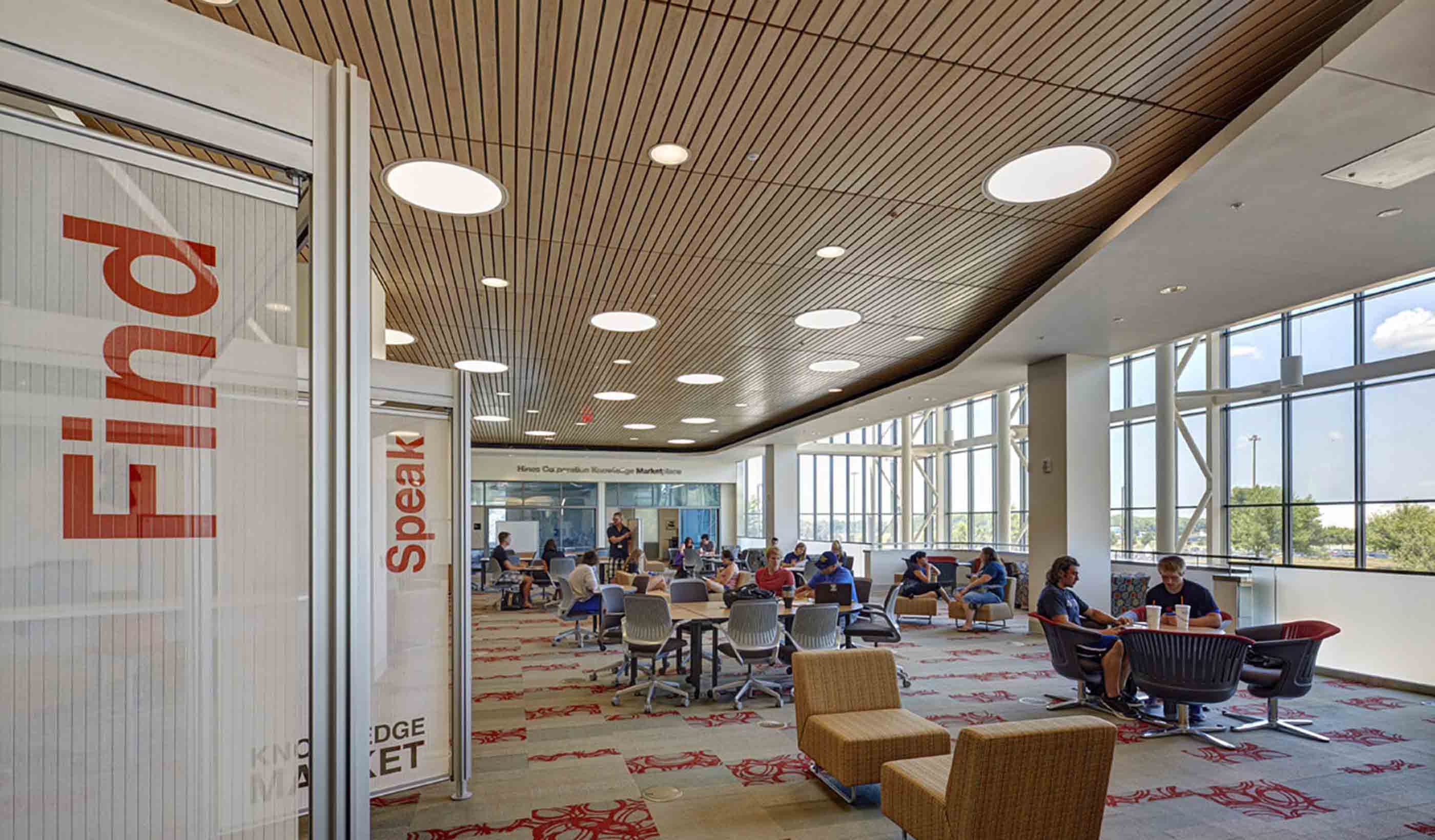 Research and benchmarking: Revisiting a 21st century library a decade after design 