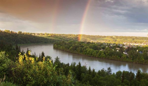 Rainbow over North Saskatchewan River. Edmonton, Alberta, Canada.